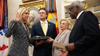 Supreme Court Justice Clarence Thomas swears in Pam Bondi as U.S. Attorney General alongside her partner John Wakefield and mother Patsy Bondi, in the Oval Office at the White House.