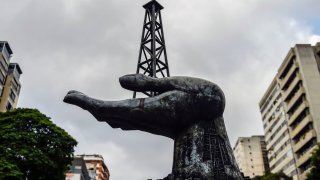 View of the monument in homage to the struggles of the Venezuelan people for the conquest of their oil heritage, in front of the headquarters of Venezuelan state-owned oil company PDVSA in Caracas, on January 29, 2019.