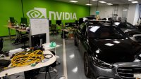 Nvidia is building out an automotive tech business. Pictured here are its autonomous vehicle test cars at the company’s auto garage in Santa Clara, California, on June 5, 2023.