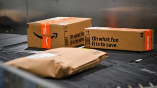 Packages ride on a conveyor belt during Cyber Monday, one of the company’s busiest days at an Amazon fulfillment center on December 2, 2024 in Orlando, Florida. 