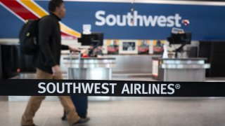 Passengers check in for Southwest Airlines flights at Chicago Midway International Airport on Feb. 18, 2025 in Chicago, Illinois.