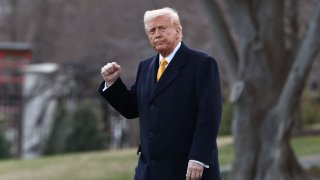 U.S. President Donald Trump gestures as he walks to board Marine One, while departing the White House en route to Florida, in Washington, D.C., U.S., March 7, 2025. 