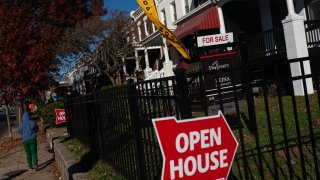 FILE PHOTO: An “Open House” sign outside of a home in Washington, DC, US, on Sunday, Nov. 19, 2023.