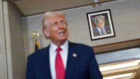 U.S. President Donald Trump visits the Department of Justice to address its workers, in Washington, D.C., U.S., March 14, 2025. 