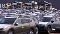 Newly manufactured cars awaiting export are parked at a port in Yokohama, south of Tokyo, Japan, on March 27, 2025.