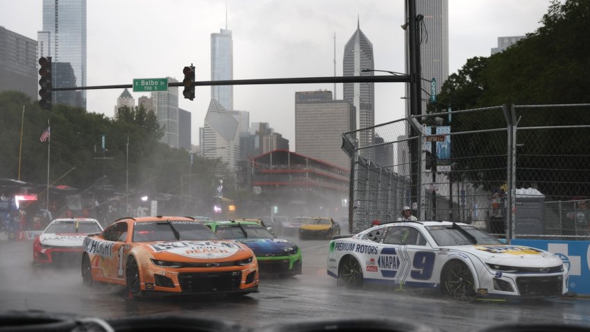Car racing the streets of Chicago.