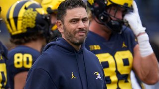 FILE - Michigan co-offensive coordinator and quarterbacks coach Matt Weiss