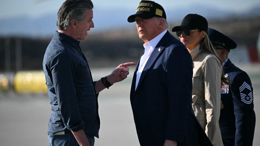 US President Donald Trump and First Lady Melania Trump are greeted by California Governor Gavin Newson upon arrival at Los Angeles International Airport in Los Angeles, California, on Jan. 24, 2025, to visit the region devastated by the Palisades and Eaton fires.