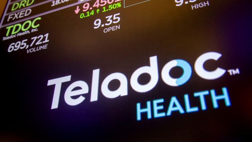 Teladoc Health Inc. signage on the floor of the New York Stock Exchange on Dec. 31, 2024.