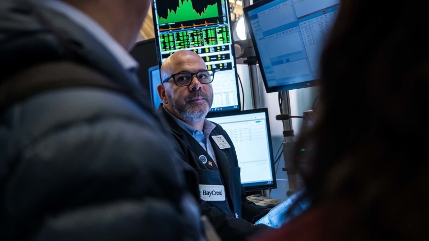 Traders work on the floor of the New York Stock Exchange on March 17, 2025. 