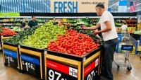 People shop for produce at a Walmart in Rosemead, California, on April 11, 2025. 