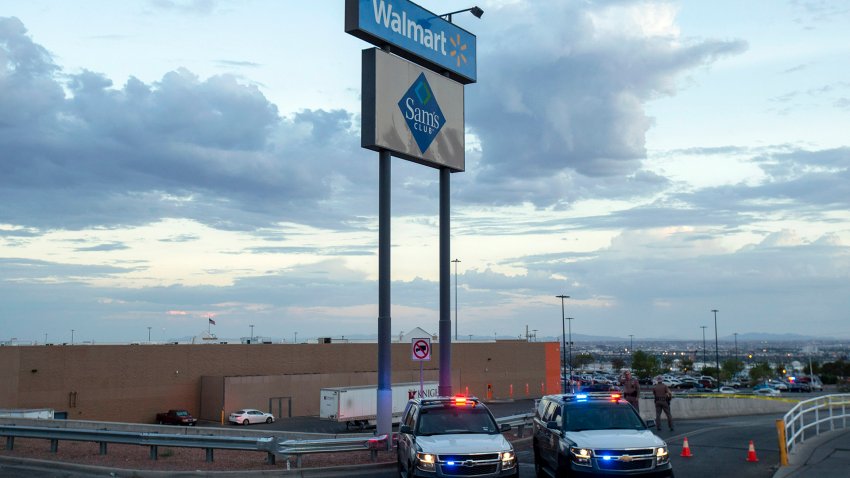 FILE – In this Aug. 3, 2019, photo Texas state police cars block the access to the Walmart store in the aftermath of a mass shooting in El Paso, Texas.