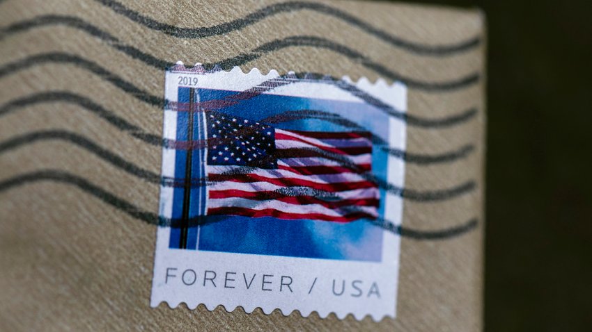 FILE - A stamp is shown on an envelope Friday, May 28, 2021, in Washington.