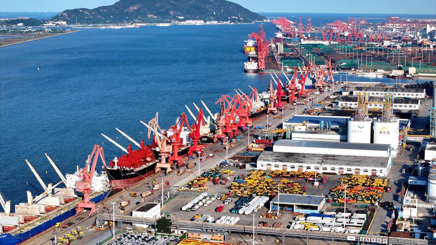 Machinery and vehicles ready for shipment at the dock of the Oriental Port Branch of Lianyungang Port in China, on Sept. 27, 2024.