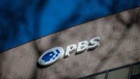 A PBS sign is seen on the Public Broadcasting Service’s headquarters building in Arlington, Virginia, Feb. 18, 2025.