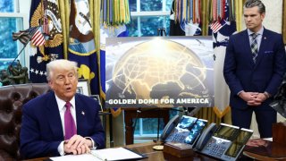 U.S. President Donald Trump makes an announcement regarding the Golden Dome missile defense shield next to U.S. Defense Secretary Pete Hegseth in the Oval Office of the White House in Washington, D.C., U.S., May 20, 2025.