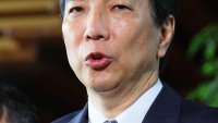 Japan’s farm minister Taku Eto responds to questions from media after submitting his resignation to Prime Minister Shigeru Ishiba at the prime minister’s office in Tokyo on May 21, 2025.