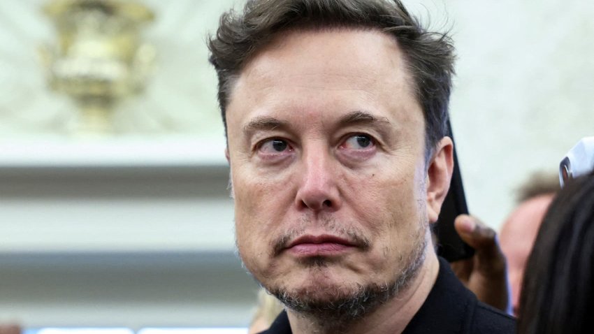 Elon Musk looks on as U.S. President Donald Trump meets South African President Cyril Ramaphosa in the Oval Office of the White House in Washington, D.C., U.S., May 21, 2025.