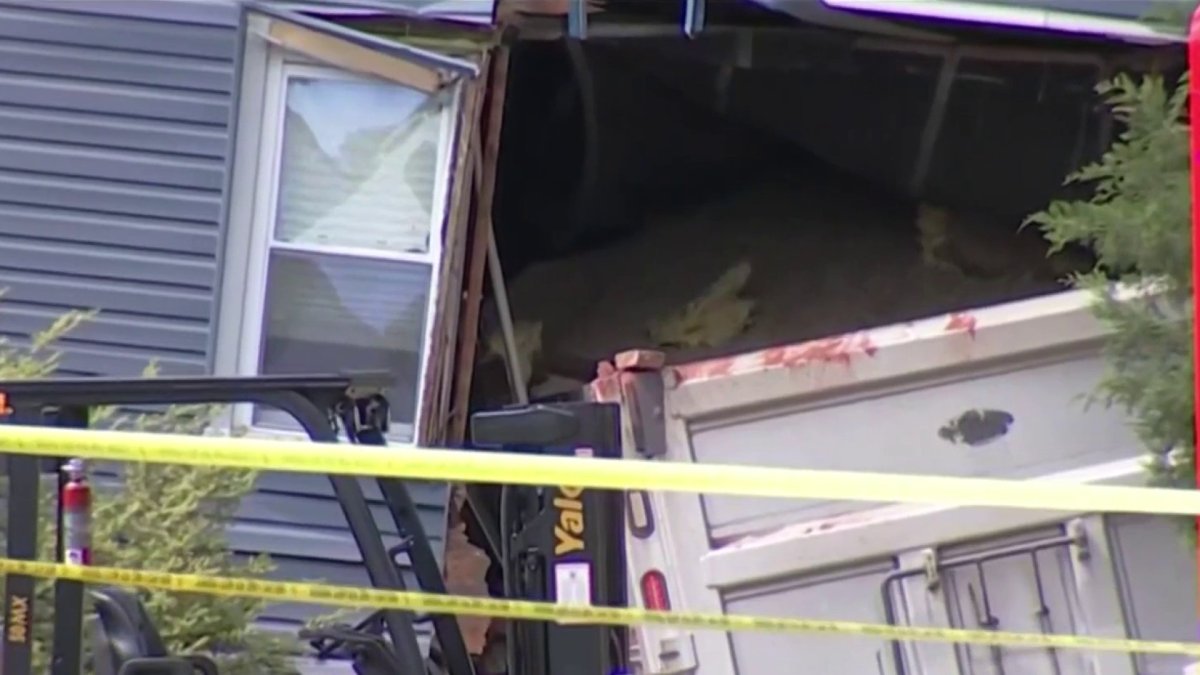 Owner of trucking company reacts after dump truck crashed into NJ home ...