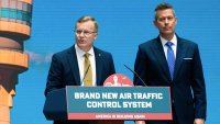 Chris Rocheleau, acting administrator of the Federal Aviation Administration, left, and Transportation Secretary Sean Duffy, right, speak about a new air traffic control infrastructure plan, Thursday, May 8, 2025, in Washington. (AP Photo/Julia Demaree Nikhinson)