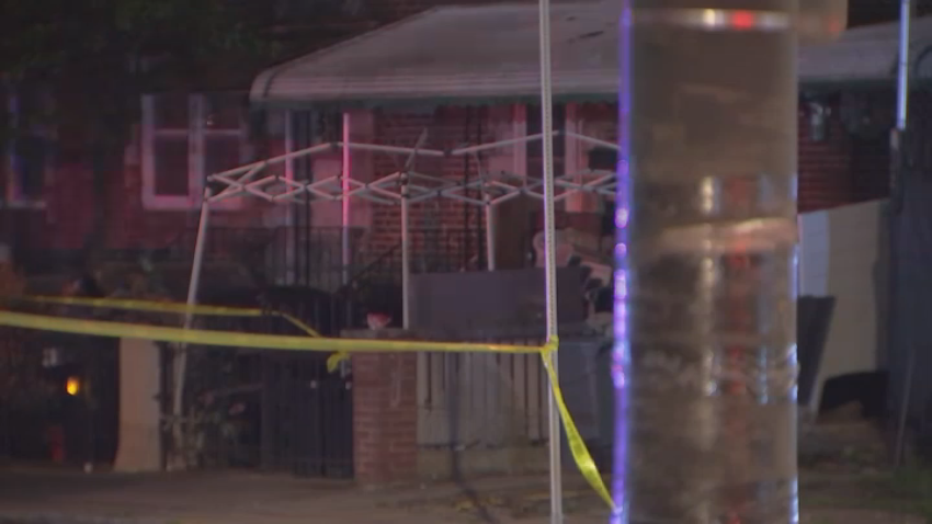 Police tape in front of home