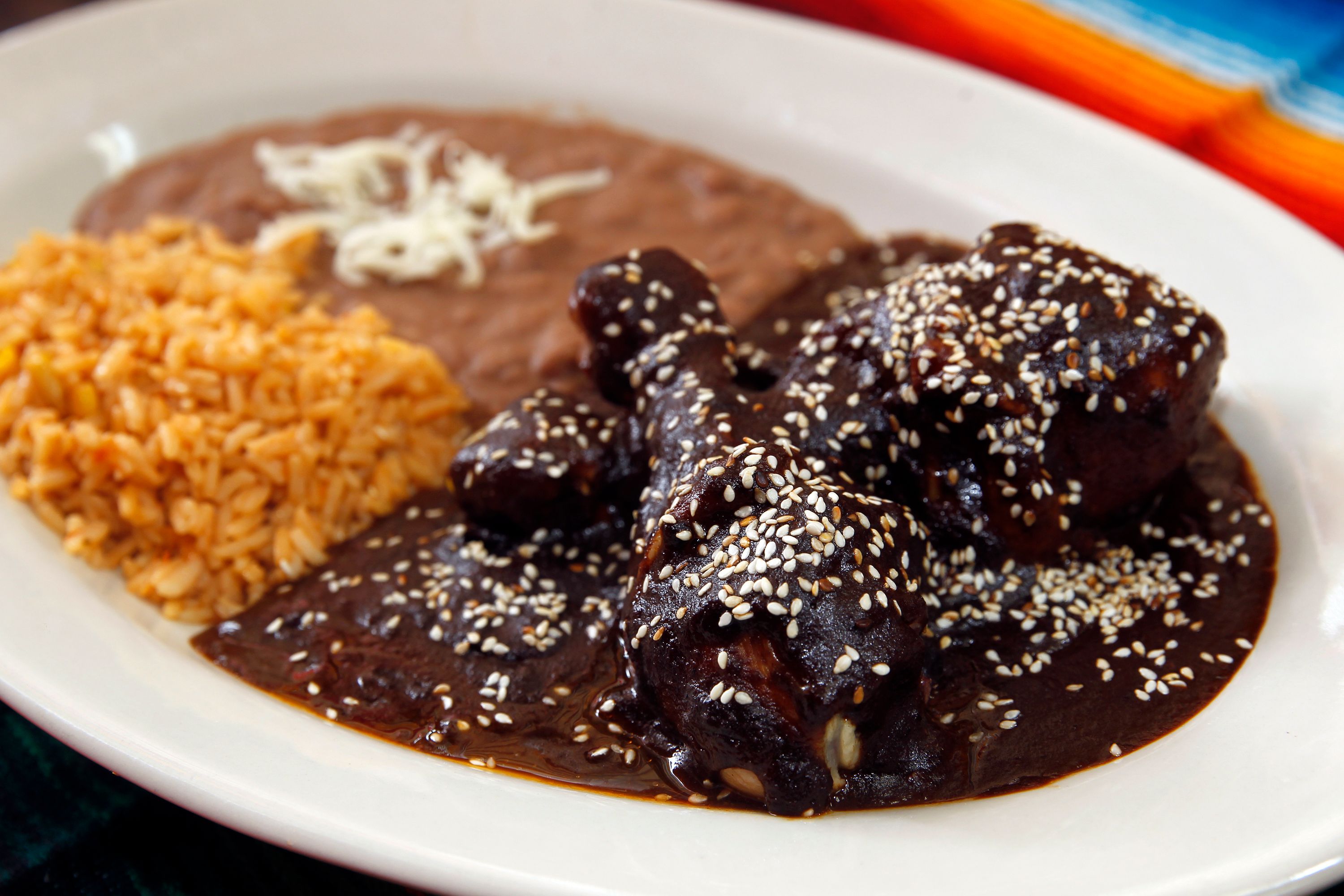 Mole Poblano with rice and beans.