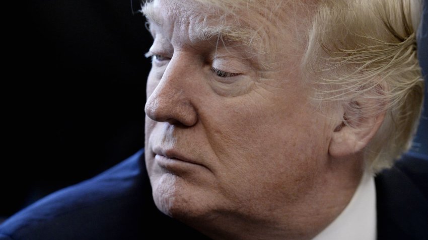 President Donald Trump looks on during a National Economic Council meeting in the Oval Office at the White House March 24, 2017 in Washington, DC.