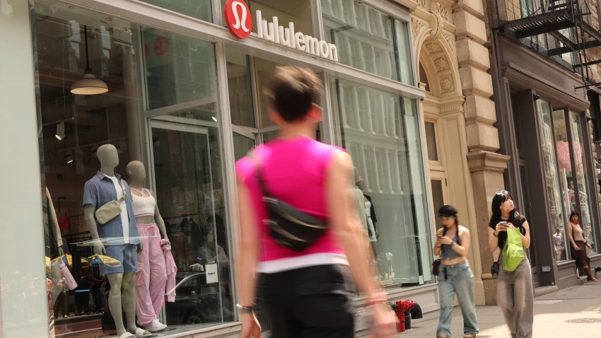 People walk past a Lululemon department store in New York City on June 5, 2024.