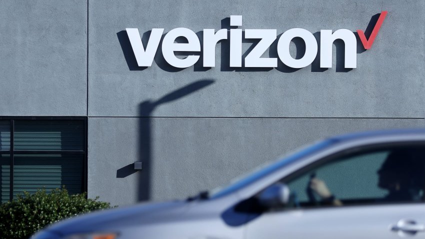 A sign is posted on the exterior of a Verizon store in Daly City, California, on Sept. 30, 2024.