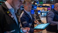 Traders work on the floor of the New York Stock Exchange on Wall Street in New York City on April 17, 2025.