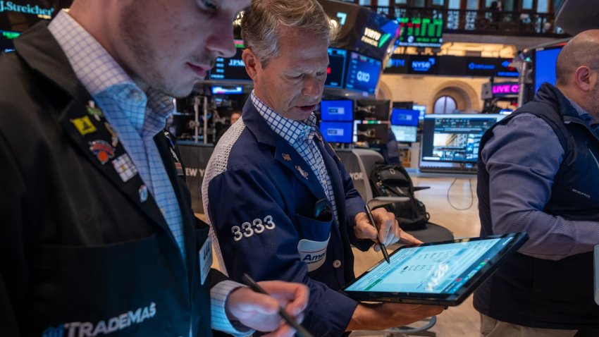 Traders work on the floor of the New York Stock Exchange on Wall Street in New York City on April 17, 2025.