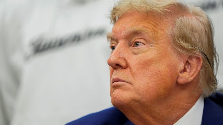 U.S. President Donald Trump looks on during a meeting with players of the Juventus soccer team in the Oval Office of the White House in Washington, D.C., U.S., June 18, 2025.