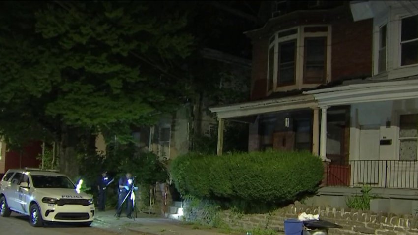 Police investigate after, officials say, a man was killed during a break-in attempt at a home along Hansberry Street in Philly's Germantown section on Sunday.