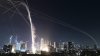 Israel's military says the latest missiles from Iran are incoming, and explosions are heard overhead