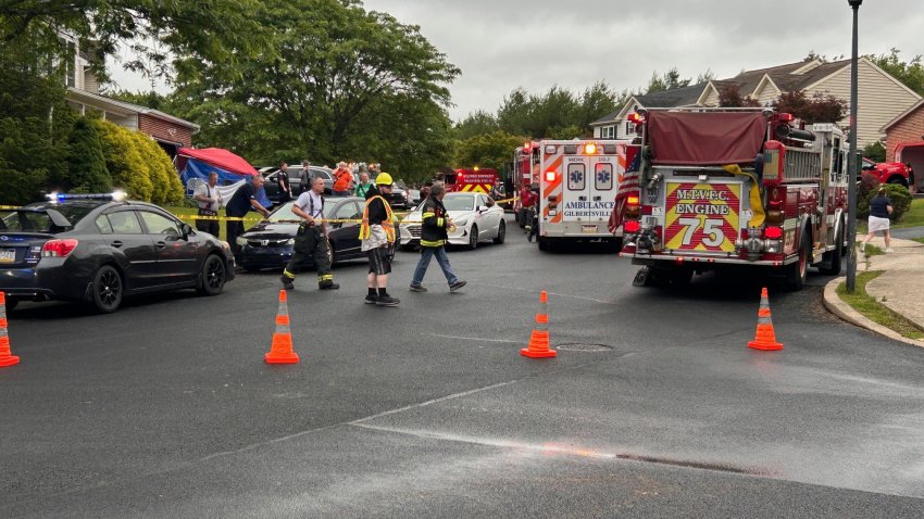 First responders gather at a home in Quakertown on Sunday, June 8, 2025, after a woman and child were found dead in a vehicle there.