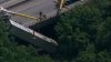 Person hurt after crash causes truck to hang from overpass in Chester County