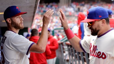 PHILADELPHIA, PA – APRIL 23: Starting pitcher Zack Wheeler #45 of the Philadelphia Phillies is congratulated by Kyle Schwarber after walking off the field in the sixth inning of a game against the Colorado Rockies at Citizens Bank Park on April 23, 2023 in Philadelphia, Pennsylvania. The Phillies defeated the Rockies 9-3. (Photo by Rich Schultz/Getty Images)