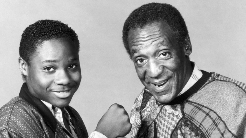 Malcolm-Jamal Warner as Theodore "Theo" Huxtable and Bill Cosby as Dr. Heathcliff "Cliff" Huxtable during Season 3 of "The Cosby Show."
