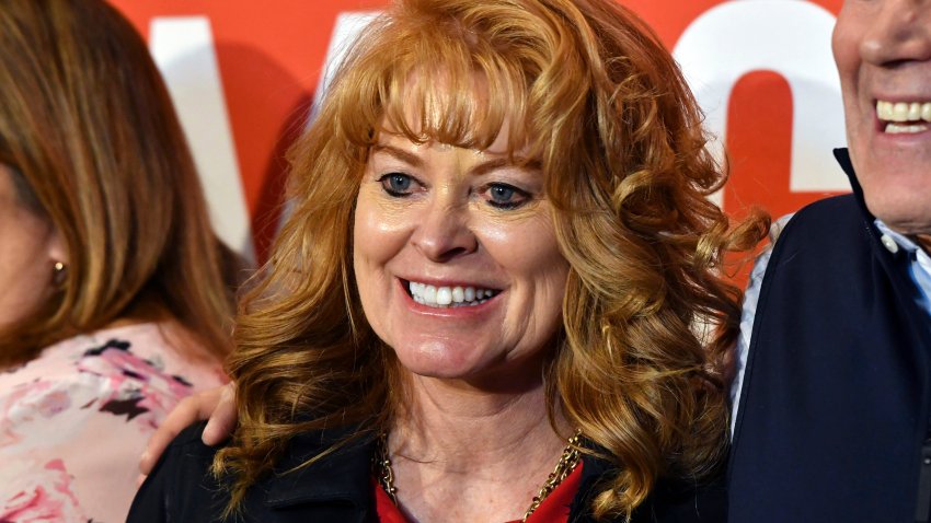 Stacy Garrity, the Republican state treasurer of Pennsylvania, poses for photos at a campaign event at the Beerded Goat Brewing Co., Thursday, April 25, 2024, in Harrisburg, Pa.