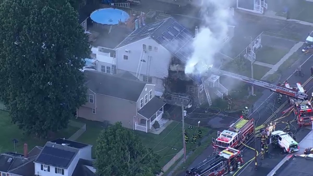 Fire Crews Battle Multiple Large House Fires Across U.S., Two Firefighters Injured