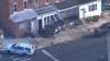 Car runs red light, crashes into porch of Philly home Thursday
