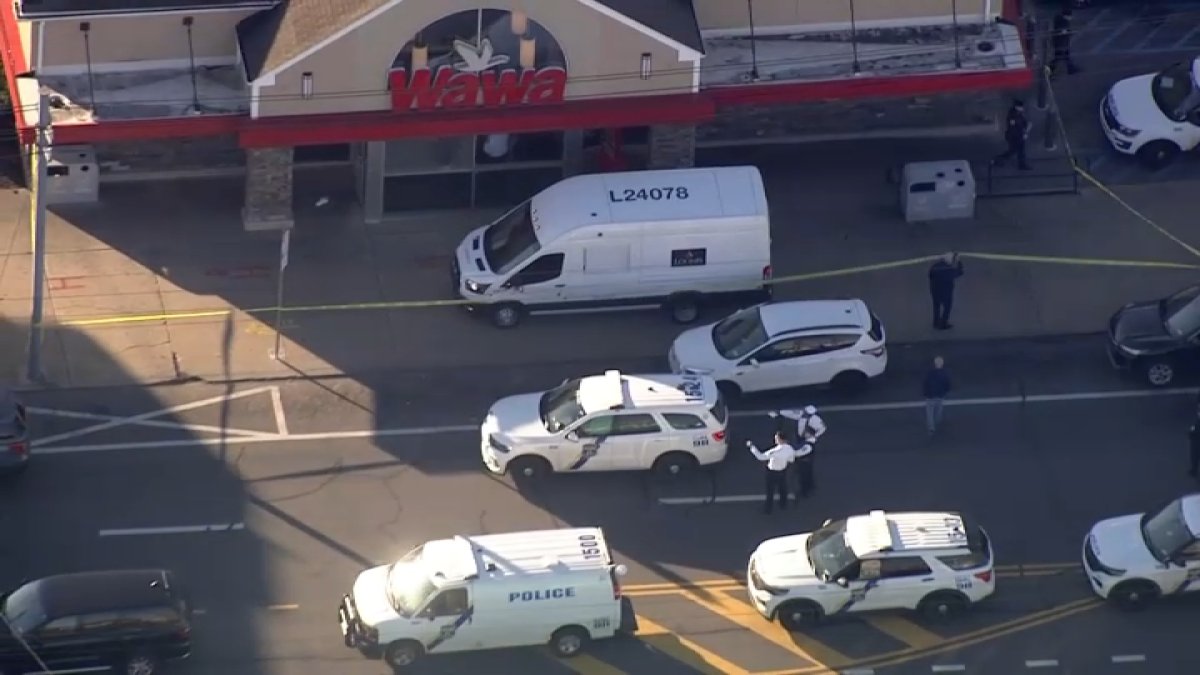 An armored truck driver shot at two armed men during an attempted robbery outside a Philadelphia Wawa, police said.