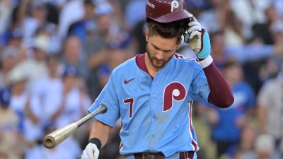 Oct 9, 2025; Los Angeles, California, USA; Philadelphia Phillies shortstop Trea Turner (7) reacts after striking out in the seventh inning against the Los Angeles Dodgers during game four of the NLDS round for the 2025 MLB playoffs at Dodger Stadium. Mandatory Credit: Jayne Kamin-Oncea-Imagn Images