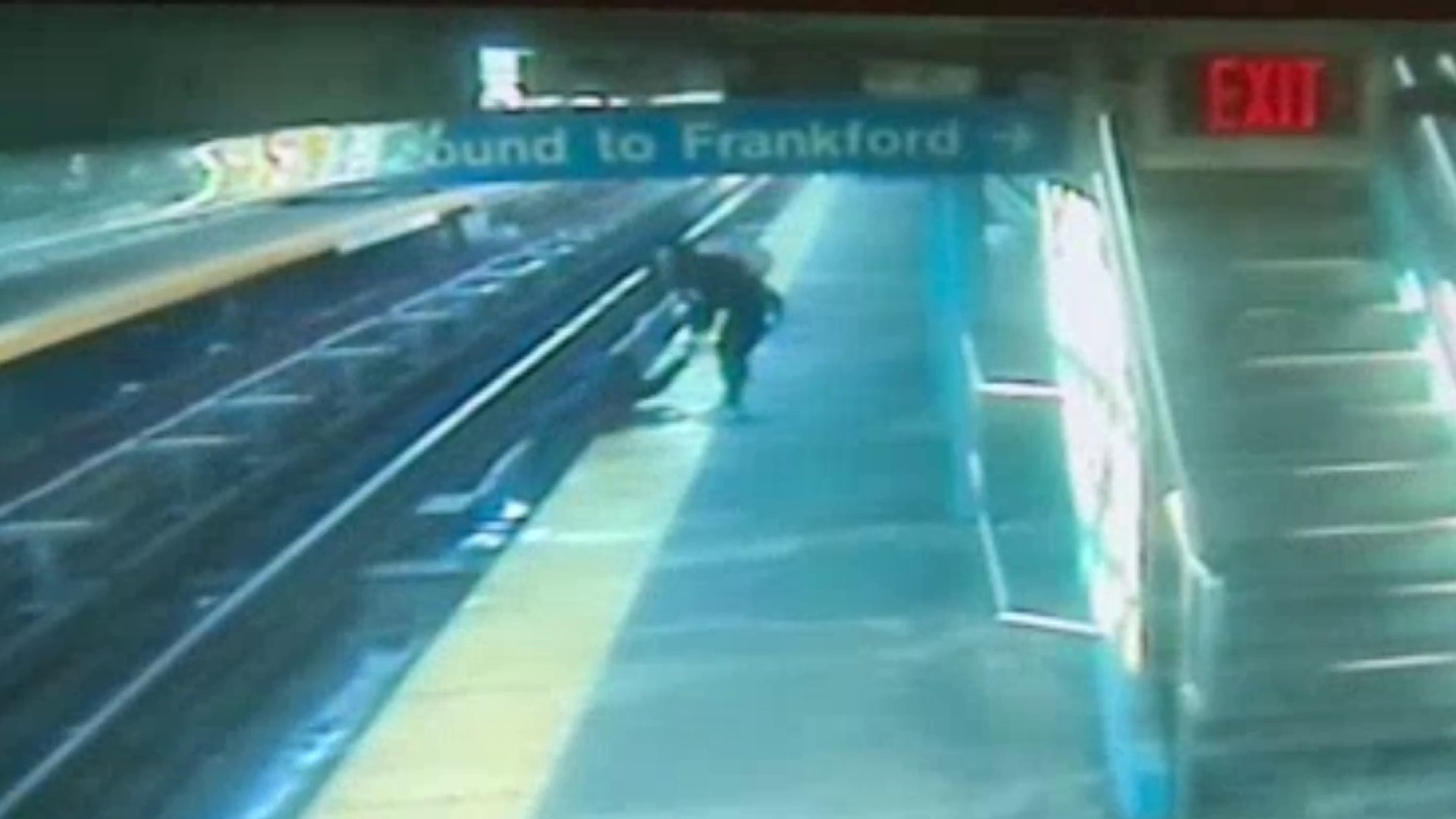 Caught on cam: Woman falls onto SEPTA tracks, bystander helps pull her to safety