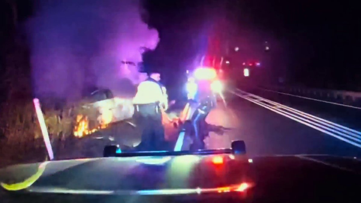 New Jersey officers rescue man from burning car just before it bursts into flames