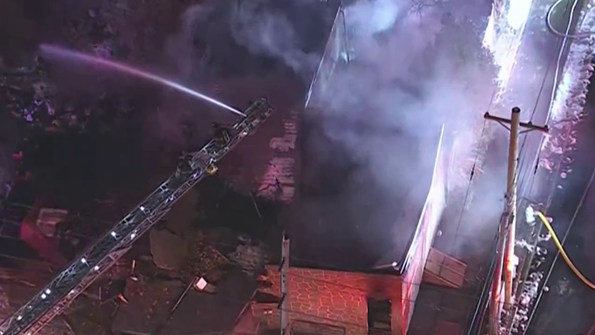 Caught on Cam: Camden, NJ, property collapses as crews work to extinguish flames