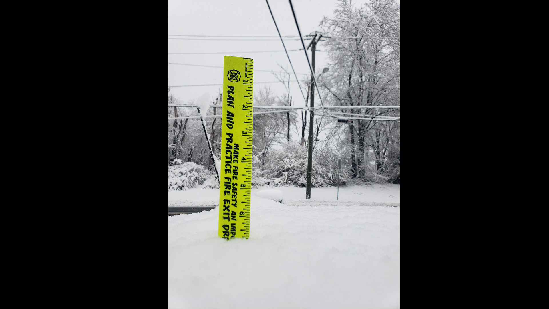 A check of how high the snow is at around 9 a.m. 
