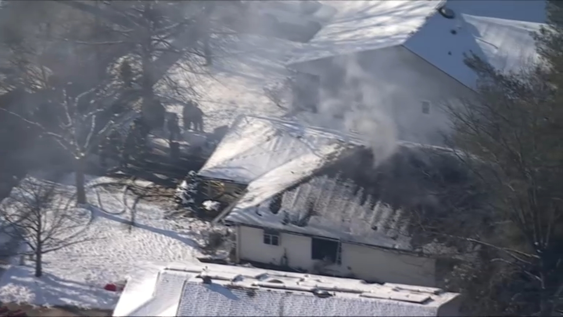 Crews work to extinguish fire at Burlington County home