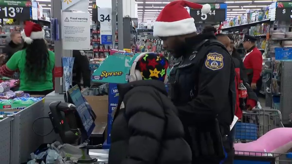 Philadelphia police spread holiday cheer to families with ‘Shop with a Cop' event