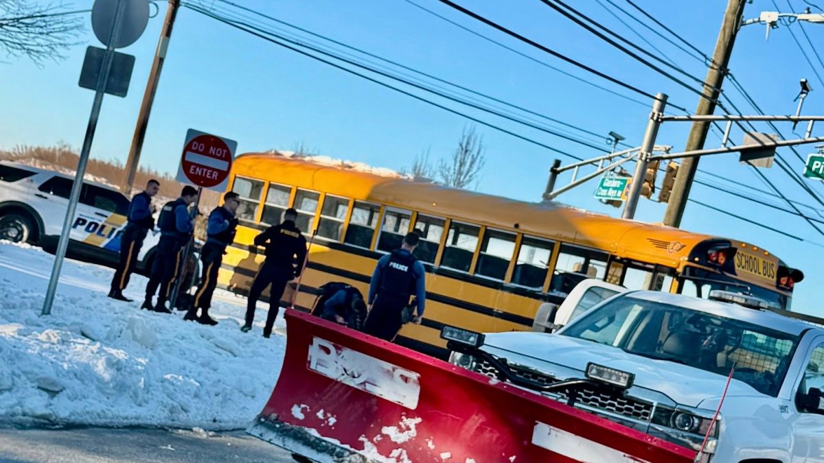 Quick-thinking New Jersey officers help free school bus stuck in snow